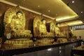 The golden buddhist statues in the church
