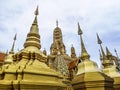 Golden buddhist temple with stupa, replica of an ancient thai temple in Ancient City at Muang Boran in Thailand Royalty Free Stock Photo