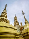 Golden buddhist temple with stupa, replica of an ancient thai temple in Ancient City at Muang Boran in Thailand