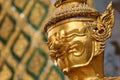 Golden Buddhistic statue in a temle