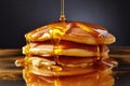 golden butter melting on stack of pancakes