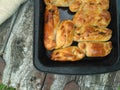 Cabbage pies on a baking sheet