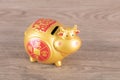 Golden calf piggy bank on the table