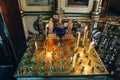 Golden candleholder in church, stand for candles in the interior of orthodox church Royalty Free Stock Photo