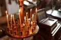 Golden candlestick with candles in the temple