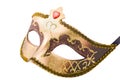 Golden carnival mask on white with path