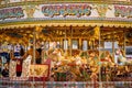 Golden carousel in the amusement park Royalty Free Stock Photo