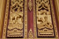 Golden carved ornament in interior and exterior of buddhist temple Wat in Thailand