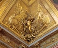 Golden ceiling Royal Chateau at the Palace of Versailles near Paris