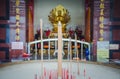 Golden censer before the Zhang Shan Temple on the hills of Maokong in Taiwan. And view for Taipei City