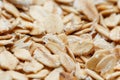 Golden cereal muesli, background and texture. Oatmeal grains. Healthy breakfast Top view. Close-up Royalty Free Stock Photo