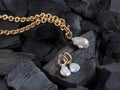 Golden chain with white baroque pearl pendant and earrings Royalty Free Stock Photo
