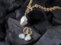 Golden chain with white baroque pearl pendant and earrings