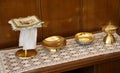 golden chalice and paten for Holy Communion during the Mass cere