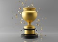 Golden champion, trophy cup with falling confetti on gray background. Free, copy space for text. Trophy cup mock up Royalty Free Stock Photo
