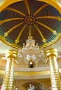 Golden chandelier at hotel lobby