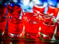 Chess board with shot glasses Royalty Free Stock Photo