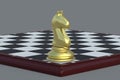 Golden chess figure knight on chess board on gray background Royalty Free Stock Photo