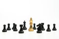 Golden Chess King standing to Be around of other chess, Concept of a leader must have courage and challenge in the competition, Royalty Free Stock Photo