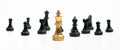 Golden Chess King standing to Be around of other chess, Concept of a leader must have courage and challenge in the competition, Royalty Free Stock Photo