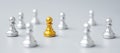 Golden chess pawn pieces stand out of people. Different, unique, individual and Social distancing prevent coronavirus infection Royalty Free Stock Photo