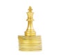 Golden chess piece with gold coin