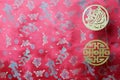 Golden chinese tiger and prosperity symbols on red fabric with chinese ornament birds and dragons. Chinese New Year of the Tiger Royalty Free Stock Photo