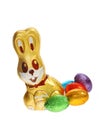 Golden chocolate Easter bunny with eggs