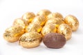 Golden chocolate easter egg on the white background Royalty Free Stock Photo