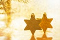 Golden christmas background with stars. Gold stars, selective focus. Royalty Free Stock Photo