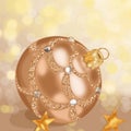 Golden Christmas ball on a blurry background of yellow and white highlights. Close-up, 3D, multi-colored bokeh