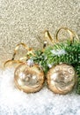 Golden christmas ball with christmas tree branch Royalty Free Stock Photo