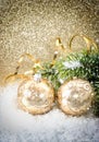 Golden christmas ball with christmas tree branch Royalty Free Stock Photo