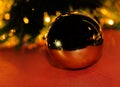 Golden christmas ball .   Christmas tree and lights Royalty Free Stock Photo