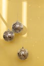 Golden christmas balls with sparkles against golden background Royalty Free Stock Photo