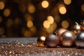 Golden Christmas baubles and bokeh background Generative AI Royalty Free Stock Photo