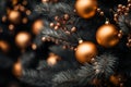 golden christmas baubles on a christmas tree Royalty Free Stock Photo