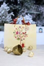 Golden Christmas bell, balls and gift bag Royalty Free Stock Photo