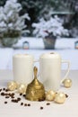 Golden Christmas bell and coffee cups