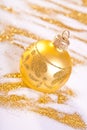 Golden Christmas Decoration. Spilled glitter