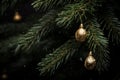 golden christmas decorations hanging from a christmas tree Royalty Free Stock Photo