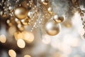 golden christmas decorations hanging from a christmas tree Royalty Free Stock Photo