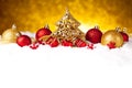 Golden christmas fir tree decoration with gold and red ornaments Royalty Free Stock Photo