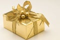 Golden Christmas gift box Royalty Free Stock Photo