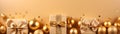 Golden Christmas gifts, balls and decorations in a row on a gold abstract background.