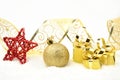 Golden christmas gifts,bauble ribbon on snow Royalty Free Stock Photo