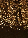 Golden Christmas lights background, golden bokeh effect Royalty Free Stock Photo