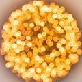 Golden christmas lights. Circle explosion of fireworks. Yellow gold lights. Bokeh abstract texture. Royalty Free Stock Photo