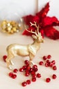 Golden Christmas reindeer with decorations. Christmas tree bauble. Royalty Free Stock Photo