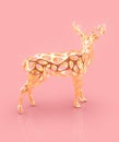 Golden Christmas reindeer figure on pink background